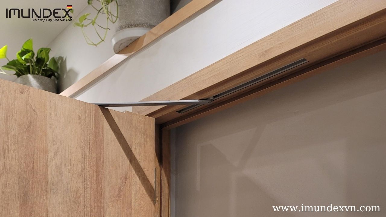 Tay đẩy hơi gắn âm Imundex